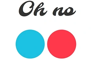Napis Oh no nad dwoma kolorowymi kołami: niebieskim i czerwonym