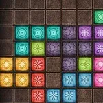 Kolorowe kwadratowe bloki układające się w różnorodne wzory na kwadratowej siatce