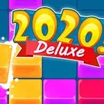 Kolorowe klocki z napisem 2020 Deluxe na niebieskim tle