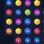 Kolorowe kulki z numerami umieszczone w siatce na ciemnym tle