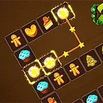 Plansza z kolorowymi kafelkami przedstawiającymi ciasteczka, babeczki i choinki połączonymi świetlistą linią, z logo Blink w prawym górnym rogu