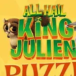 Lemur w koronie i mały lemur na żółtym tle obok kolorowego napisu