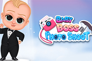 Chłopiec w smokingu z dużymi oczami stoi obok kolorowego napisu i ilustracji aparatu fotograficznego