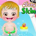 Małe dziecko z uśmiechem siedzi w wannie z kaczuszką, obok kolorowe napisy Baby Hazel Skin Care