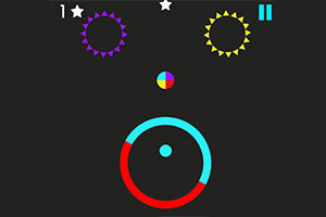 Czarne tło z kolorowymi kółkami i przełącznikami; purpurowo-białe i żółto-białe obręcze na górze, kolorowa piłka pośrodku i czerwono-niebieska obręcz na dole