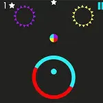 Czarne tło z kolorowymi kółkami i przełącznikami; purpurowo-białe i żółto-białe obręcze na górze, kolorowa piłka pośrodku i czerwono-niebieska obręcz na dole