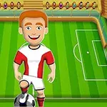 Animowany piłkarz w czerwono-białym stroju stoi na boisku z piłką przy nodze, w tle widoczne są trybuny z kibicami