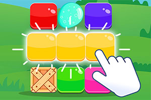 Kolorowe bloki i skrzynka na tle zielonego krajobrazu z ręką wskazującą na jeden z bloków