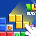 Kolorowe klocki w kształcie różnych bloków, z ręką wskazującą na jeden z klocków, na tle niebieskiego gradientu, z napisem w prawym górnym rogu