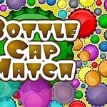 Kolorowe kapsle różnych rozmiarów z napisem pośrodku