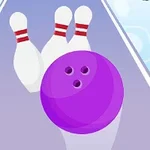 Fioletowa kula do kręgli zbliża się do trzech białych kręgli na torze