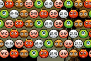 Różnokolorowe emotikony z różnymi wyrazami twarzy ustawione w rzędach na ciemnym tle