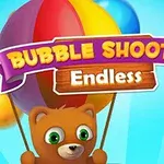 Miś trzymający balony z kolorowym napisem Bubble Shooter Endless na tle niebieskiego nieba