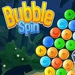 Kolorowe bąbelki ułożone w okrąg z wyeksponowaną żółtą gwiazdą na ciemnym tle z widocznym napisem Bubble Spin