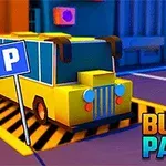 Żółty autobus zaparkowany na parkingu z widocznym znakiem P i kolorowymi budynkami w tle