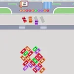 Kolorowe, małe samochodziki ustawione w rzędach na szarej powierzchni, z ulicą z pasami w tle