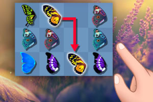 Motylki w różnorodnych kolorach ułożone w siatce, z czerwoną strzałką wskazującą przesunięcie i ręką obok