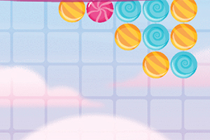 Kolorowe cukierki w formie okrągłych lizaków zawieszone na jasnym tle z chmurami