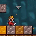 Postać w czerwonym kombinezonie i żółtym kasku stoi na platformach z brązowymi i złotymi blokami, a nad nią unosi się diament