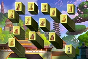 Klocki z orientalnymi symbolami ustawione w tle azjatyckiego krajobrazu z pagodami i drzewami sakura