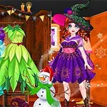 Kobieta w stroju czarownicy stoi obok manekinów z kolorowymi sukienkami w pomieszczeniu udekorowanym na Halloween