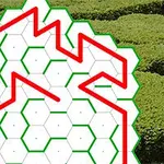 Czerwony, zygzakowaty wzór na białym tle z sześciokątną siatką na tle zielonego pola