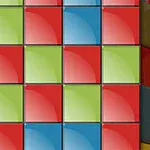 Kolorowe kwadratowe bloki ułożone w siatkę, w kolorach zielonym, czerwonym i niebieskim