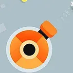 Pomarańczowa armata strzelająca w stronę gwiazdki na szarym tle z żółtymi kwadratami