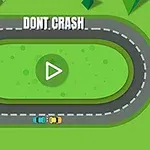 Owalny tor wyścigowy z dwoma samochodami, niebieskim i żółtym, z napisem DON’T CRASH na zielonym tle