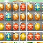 Kolorowe, wzorzyste pisanki ułożone w siatce z oznaczeniami liczbowymi