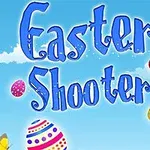Niebieski napis Easter Shooter na tle nieba z kolorowymi pisankami i motylem