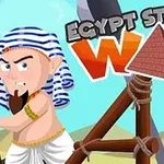 Postać w stroju egipskim z katapultą, na tle napis Egypt Stone War