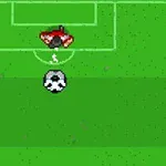 Widok z góry na boisko piłkarskie z piłkarzami w czerwonym i zielonym stroju oraz piłką na środku