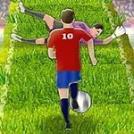 Piłkarz w czerwonej koszulce z numerem 10, dryblujący z piłką w kierunku leżącego bramkarza na trawiastej ścieżce