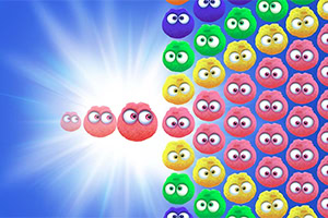 Kolorowe, pluszowe kulki o różnych wyrazach twarzy na niebieskim tle z efektem świetlnym