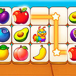 Kolorowe klocki z różnymi owocami, w tym jabłka, awokado i śliwki, oraz połączona linia ze świecącymi gwiazdkami