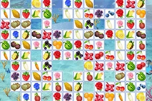 Kolorowe kafelki przedstawiające różnorodne owoce i warzywa ułożone na planszy