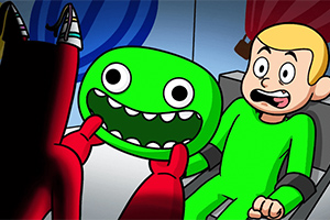 Postać w zielonym stroju siedzi na krześle i jest przestraszona, podczas gdy inna postać trzyma zieloną maskę z dużymi oczami i szerokim uśmiechem