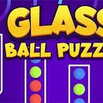 Kolorowe kulki w przezroczystych szklankach na fioletowym tle z żółtym napisem Glass Ball Puzzle