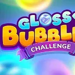 Kolorowy napis Glossy Bubbles Challenge z białymi i żółtymi literami, otoczony kolorowymi bąbelkami na niebieskim tle
