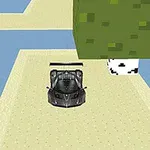 Widok z góry na czarny samochód wyścigowy na wąskiej drodze z zielonymi drzewami po bokach