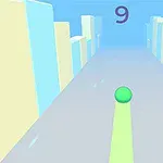 Zielona kula na szarej drodze z pastelowymi budynkami po bokach i liczbą dziewięć nad nią