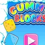 Kolorowy napis GUMMY BLOCKS otoczony chmurami, z różnokolorowymi klockami i przyciskiem odtwarzania na środku