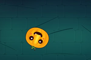 Uśmiechnięta pomarańczowa dynia z oczami na ciemnym, zielonym tle z wzorem cegieł