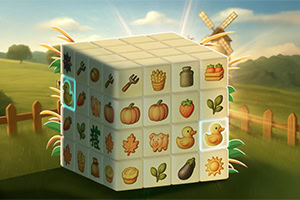 Sześcian z ikonami przedstawiającymi warzywa, owoce i przedmioty gospodarstwa domowego na tle wiejskiego krajobrazu z wiatrakiem