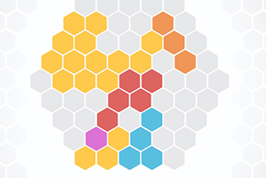 Kolorowe sześciokąty ułożone w różnorodne kształty na jasnym tle