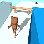 Postać przypominająca misia balansująca na drewnianym kijku na dachu budynku