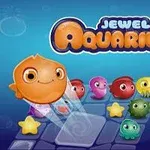 Rybka i kolorowe morskie stworzenia na planszy, z napisem Jewel Aquarium na niebieskim tle