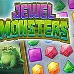 Kolorowe potwory stojące obok planszy z klejnotami z napisem Jewel Monsters