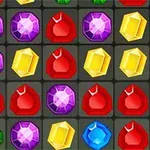 Kolorowe, błyszczące klejnoty ułożone w rzędach na siatce